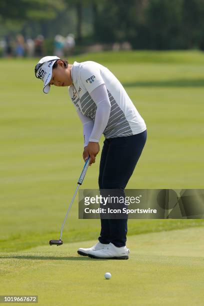 Golfer golfer Amy Yang putts on the first green during the final round of the Indy Women In Tech on August 19, 2018 at the Brickyard Crossing Golf...
