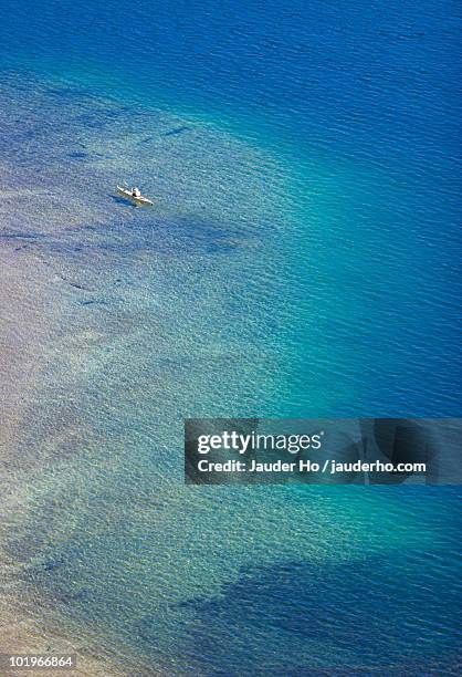 lonely kayaker - emerald bay lake tahoe bildbanksfoton och bilder