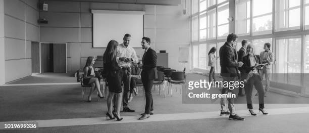 group of business people in the conference room - business man in crowd stock pictures, royalty-free photos & images
