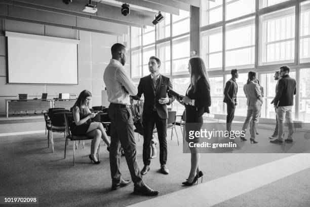 group of business people in the conference room - black and white stock pictures, royalty-free photos & images