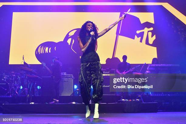 Winnie Harlow speaks onstage during the MTV VMA Kickoff Concert presented by DirecTV Now at Terminal 5 on August 19, 2018 in New York City.