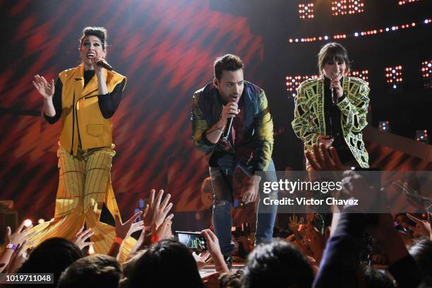 Singers Ashley Grace Perez of Ha-Ash, Prince Royce and Hanna Nicole of Ha-Ash perform on stage with Los Polinesios during the Nickelodeon Kids'...