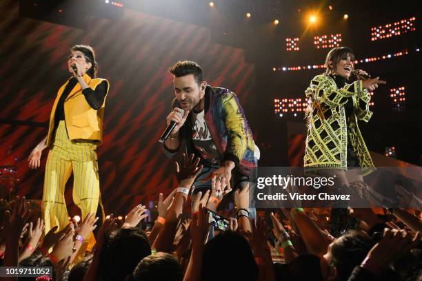 Singers Ashley Grace Perez of Ha-Ash, Prince Royce and Hanna Nicole of Ha-Ash perform on stage with Los Polinesios during the Nickelodeon Kids'...