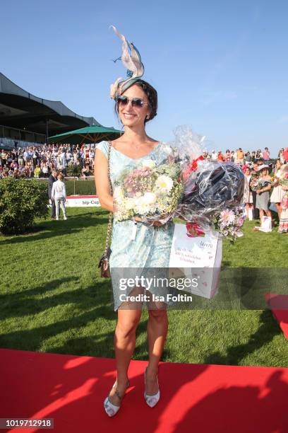 Sylvie Hamacher, the 2nd winner of the hat competition during the Audi Ascot Race Day 2018 on August 19, 2018 in Hanover, Germany.