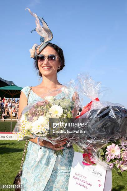 Sylvie Hamacher, the 2nd winner of the hat competition during the Audi Ascot Race Day 2018 on August 19, 2018 in Hanover, Germany.