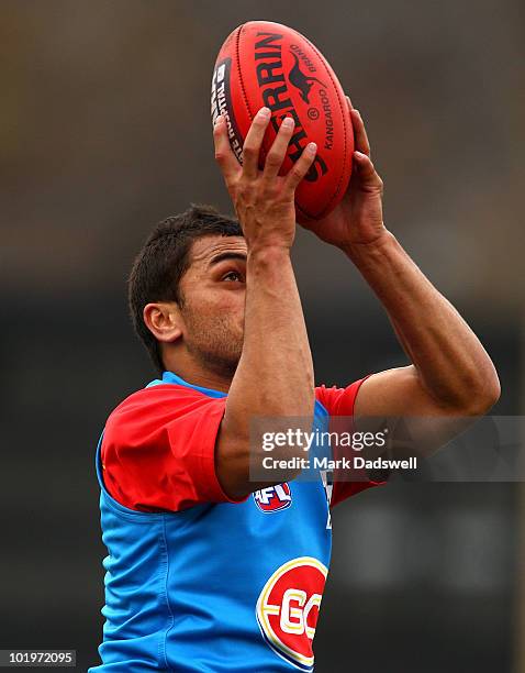 Karmichael Hunt of the Gold Coast marks during a Gold Coast VFL training session at Wesley College Oval on June 11, 2010 in Melbourne, Australia.