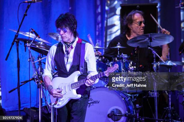 Guitarist Jeff Beck and drummer Vinnie Colaiuta performs at PNC Music Pavilion on August 19, 2018 in Charlotte, North Carolina.