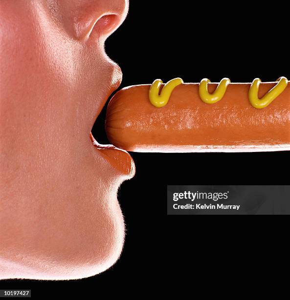 young woman, hotdog between lips, profile, close-up - women open mouth stock pictures, royalty-free photos & images