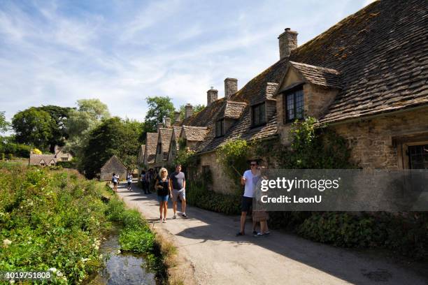 village of bibury in the cotswolds, england, uk - cotswolds stock pictures, royalty-free photos & images