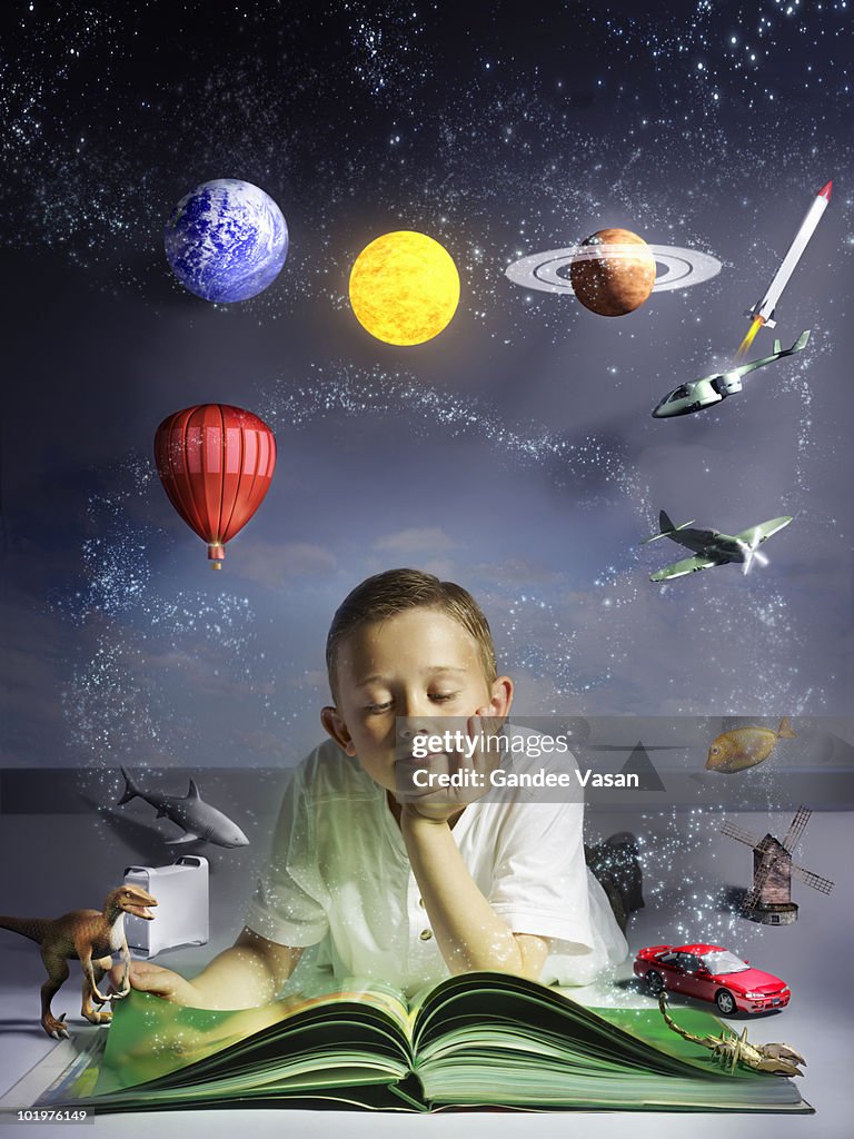 Child reading book with his imagination coming to 