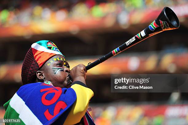 South Africa fan blows a Vuvuzela as she awaits the Opening Ceremony ahead of the 2010 FIFA World Cup South Africa Group A match between South Africa...