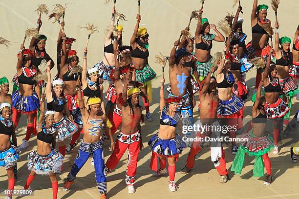 Dancers in traditional costume performs during the Opening Ceremony ahead of the 2010 FIFA World Cup South Africa Group A match between South Africa...