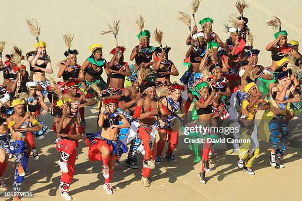 Dancers in traditional costume performs during the Opening Ceremony ahead of the 2010 FIFA World Cup South Africa Group A match between South Africa...