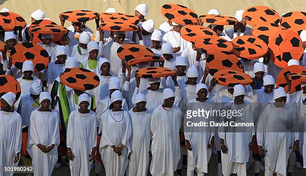 Dancers in traditional costume perform during the Opening Ceremony ahead of the 2010 FIFA World Cup South Africa Group A match between South Africa...