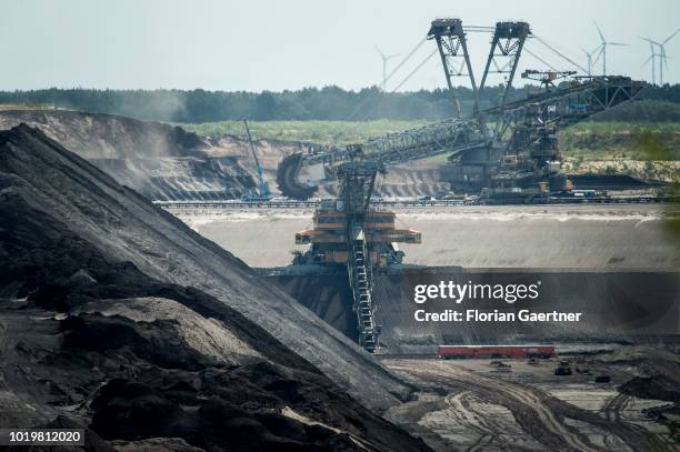 Bucket wheel excavator and a bucket excavator are pictured at the lignite mine Welzow-Sued on August 15, 2018 in Welzow, Germany.