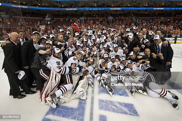 The Chicago Blackhawks pose for a photo with the Stanley Cup after defeating the Philadelphia Flyers 4-3 in overtime, at Game Six of the 2010 Stanley...