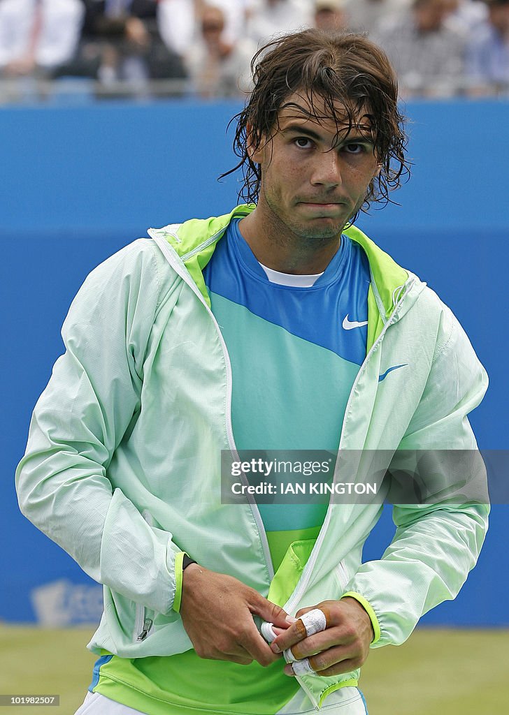 Rafael Nadal of Spain gestures after los