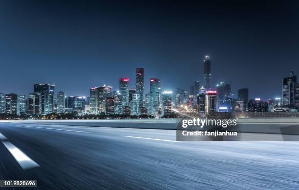 elevated road,city skyline on background - beijing city stock-fotos und bilder