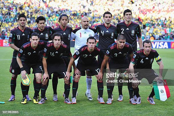 Players of Mexico line up prior to the 2010 FIFA World Cup South Africa Group A match between South Africa and Mexico at Soccer City Stadium on June...