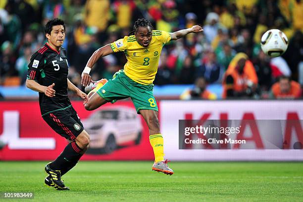 Siphiwe Tshabalala of South Africa scores the first goal during the 2010 FIFA World Cup South Africa Group A match between South Africa and Mexico at...