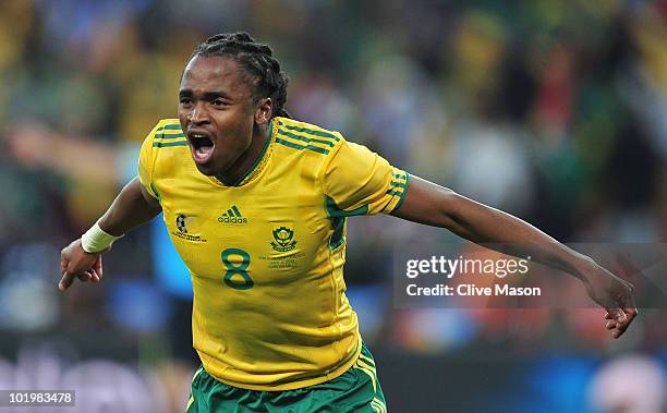 Siphiwe Tshabalala of South Africa celebrates scoring the first goal during the 2010 FIFA World Cup South Africa Group A match between South Africa...