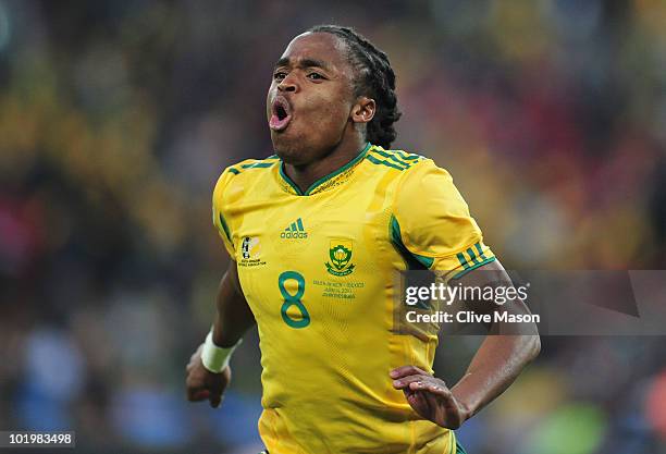 Siphiwe Tshabalala of South Africa celebrates scoring the first goal during the 2010 FIFA World Cup South Africa Group A match between South Africa...