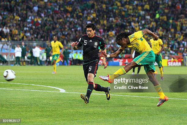 Siphiwe Tshabalala of South Africa scores the first goal during the 2010 FIFA World Cup South Africa Group A match between South Africa and Mexico at...