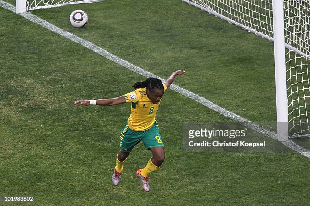 Siphiwe Tshabalala of South Africa celebrates scoring the first goal during the 2010 FIFA World Cup South Africa Group A match between South Africa...