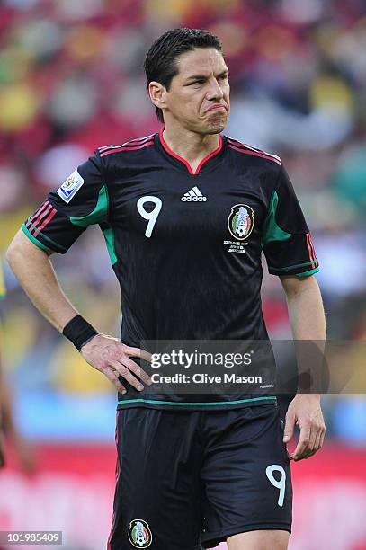 Guillermo Franco of Mexico reacts to a decision during the 2010 FIFA World Cup South Africa Group A match between South Africa and Mexico at Soccer...