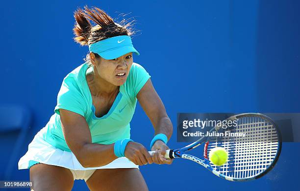 Na Li of China plays a backhand in her match against Kaia Kanepi of Estonia in the Women's Singles during the AEGON Classic Tennis at the Edgbaston...