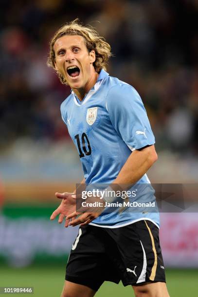 Diego Forlan of Uruguay gestures during the 2010 FIFA World Cup South Africa Group A match between Uruguay and France at Green Point Stadium on June...