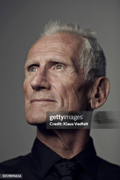 portrait of cool mature man looking out - face black and white stock pictures, royalty-free photos & images