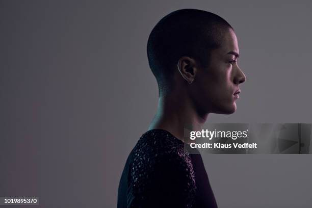 profile shot of beautiful young man, shot on studio - side profile man fotografías e imágenes de stock