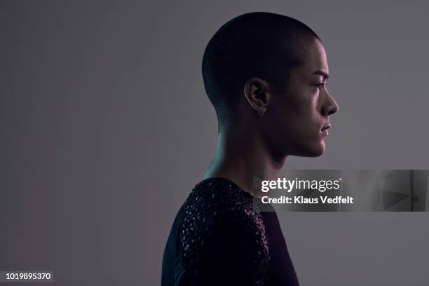 profile shot of beautiful young man, shot on studio - shaved head profile stock pictures, royalty-free photos & images