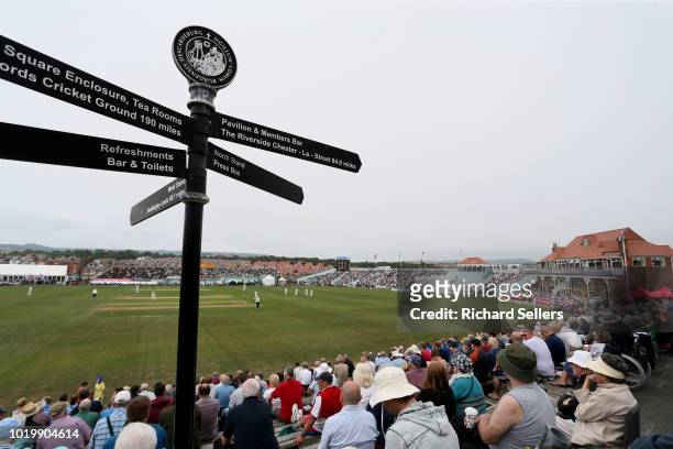 Spectators watch the action during day two of the Specsavers Championship Division One match between Yorkshire and Worcestershire at North Marine...
