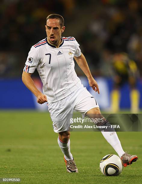 Franck Ribery of France runs with the ball during the 2010 FIFA World Cup South Africa Group A match between Uruguay and France at Green Point...