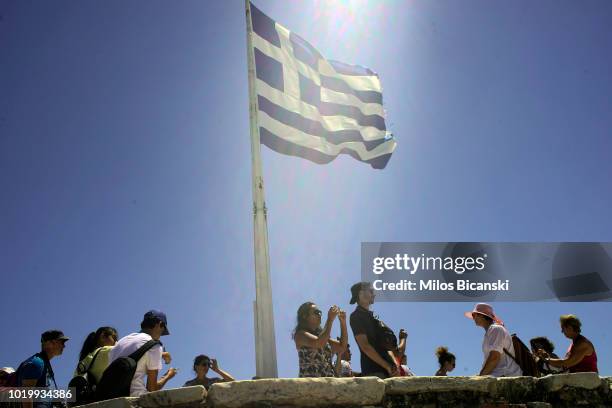 Tourists on Acropolis Hill on August 14, 2018 in Athens, Greece. Greece's final bailout officially ends after eight years of hugely unpopular and...