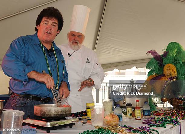 Singer/Songwriter Marty Raybon helps Chef John "Chappy" cook a dish while attendingh the Chap Dat! Creole Cooking Show at Sports Zone during The 2010...