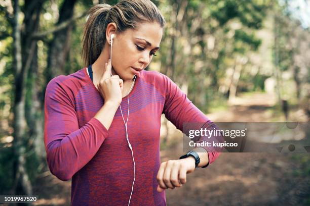 getting her heart rate up - taking pulse stock pictures, royalty-free photos & images