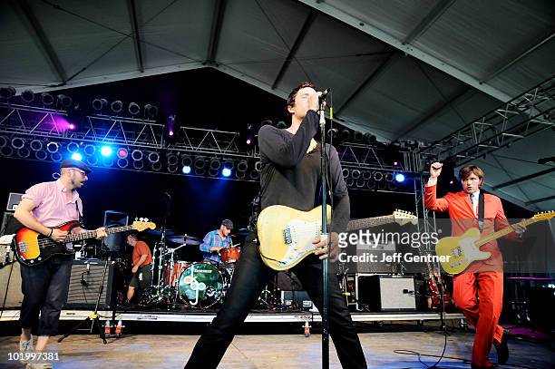 Tim Norwood, Dan Konopka, Damian Kulash and Andy Ross of OK Go perform during the 2010 Bonnaroo Music and Arts Festival - Day 2 on June 11, 2010 in...