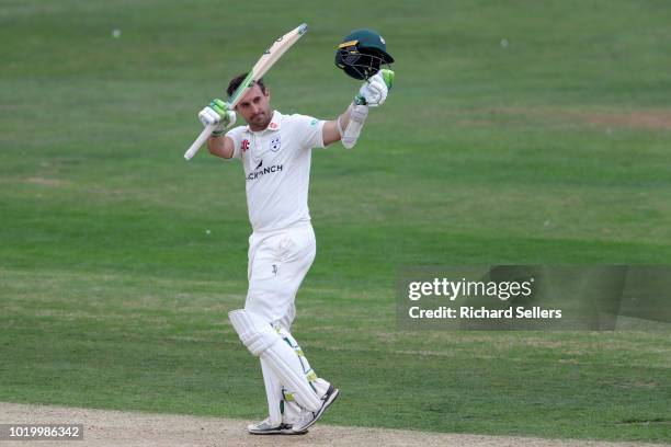 Worcestershire's Daryll Mitchell raises his bat after his century during day two of the Specsavers Championship Division One match between Yorkshire...