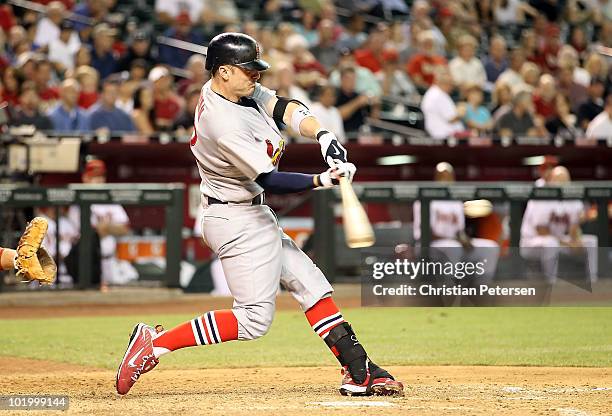 Brendan Ryan of the St. Louis Cardinals hits a 3 run home run against the Arizona Diamondbacks during the seventh inning of the Major League Baseball...