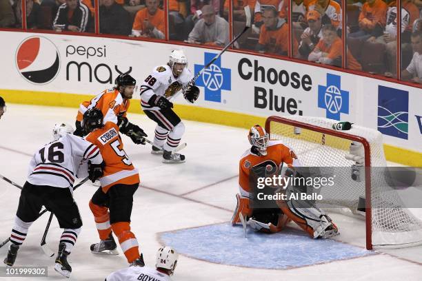 Patrick Kane of the Chicago Blackhawks celebrates after scoring the game-winning goal in overtime against Michael Leighton of the Philadelphia Flyers...