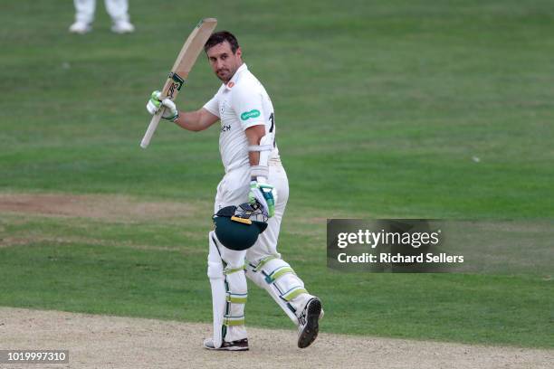 Worcestershire's Daryll Mitchell raises his bat after his century during day two of the Specsavers Championship Division One match between Yorkshire...