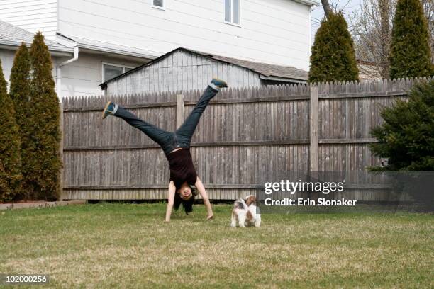 backyard cartwheel - cartwheel stock pictures, royalty-free photos & images