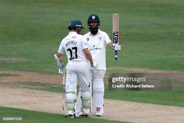 Worcestershire's Moeen Ali raises after his half century during day two of the Specsavers Championship Division One match between Yorkshire and...