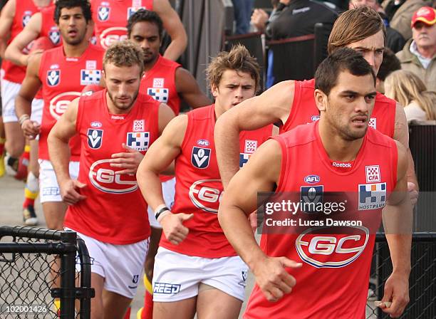 Karmichael Hunt of the Gold Coast runs on to the field during the round nine VFL match between the Coburg Tigers and the Gold Coast at Highgate...