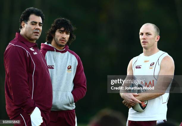 Mal Meninga, Johnathan Thurston and Darren Lockyer of the Maroons chat during a Queensland Maroons Origin training session at the Hyatt Resort,...