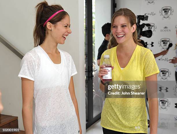 Actresses Amanda Crew and Amber Borycki attend the "Muscle Milk Light" Women's Fitness Retreat on June 11, 2010 in Beverly Hills, California.