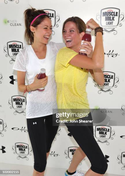 Actresses Amanda Crew and Amber Borycki attend the "Muscle Milk Light" Women's Fitness Retreat on June 11, 2010 in Beverly Hills, California.